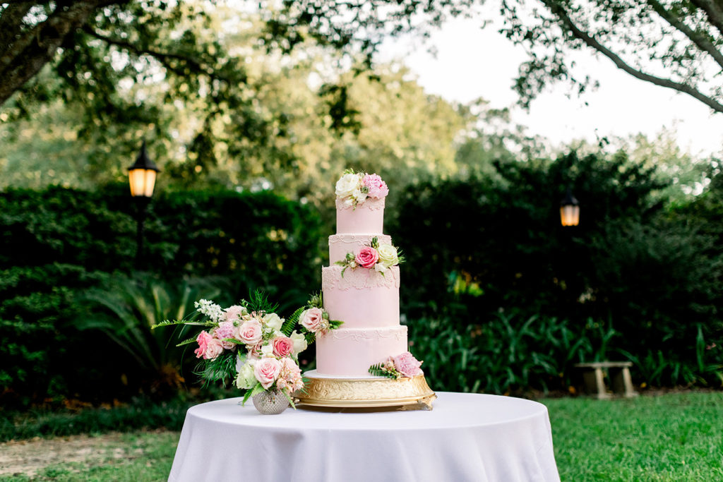Blush, four-tier vegan wedding cake by Shake Sugary.