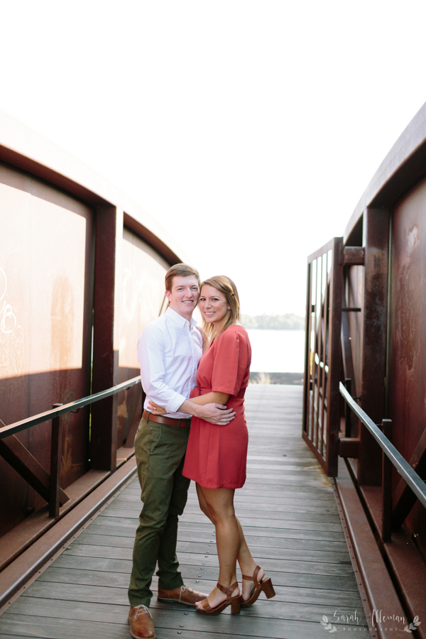 The Mississippi Riverfront is a beautiful backdrop for engagement photos. | Photo by Sarah Alleman Photography