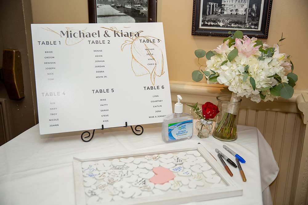 Kiara and Michael's seating chart and guest book. Photo: Brian Jarreau Photography