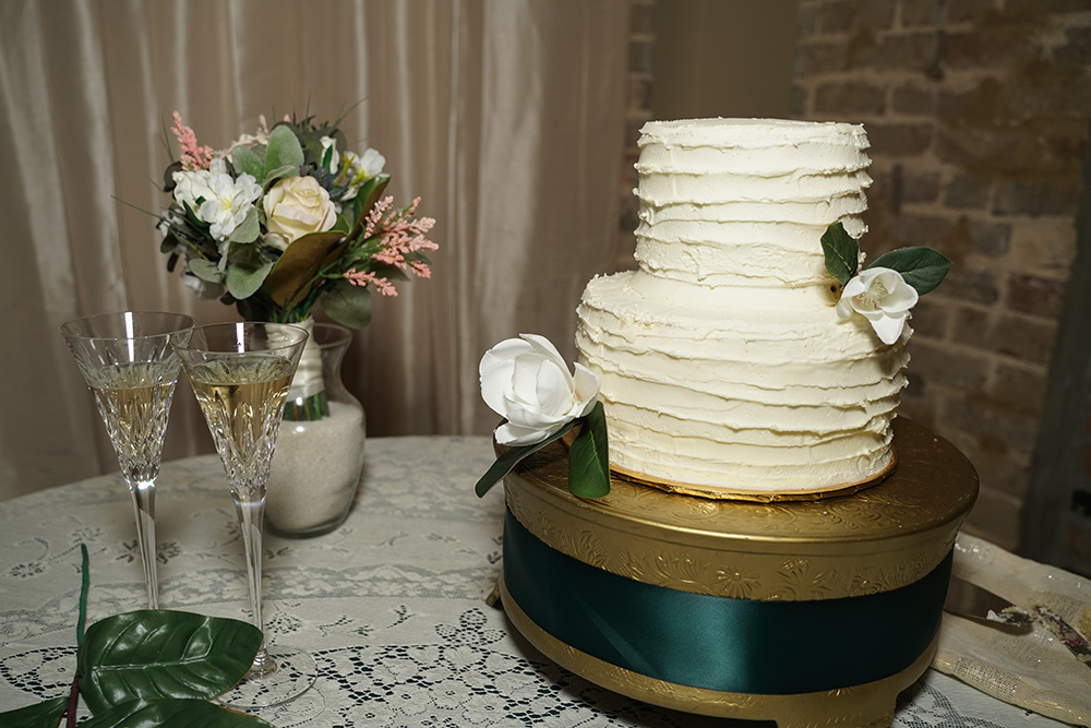 The wedding cake by 5 Dough 4 Bakery.