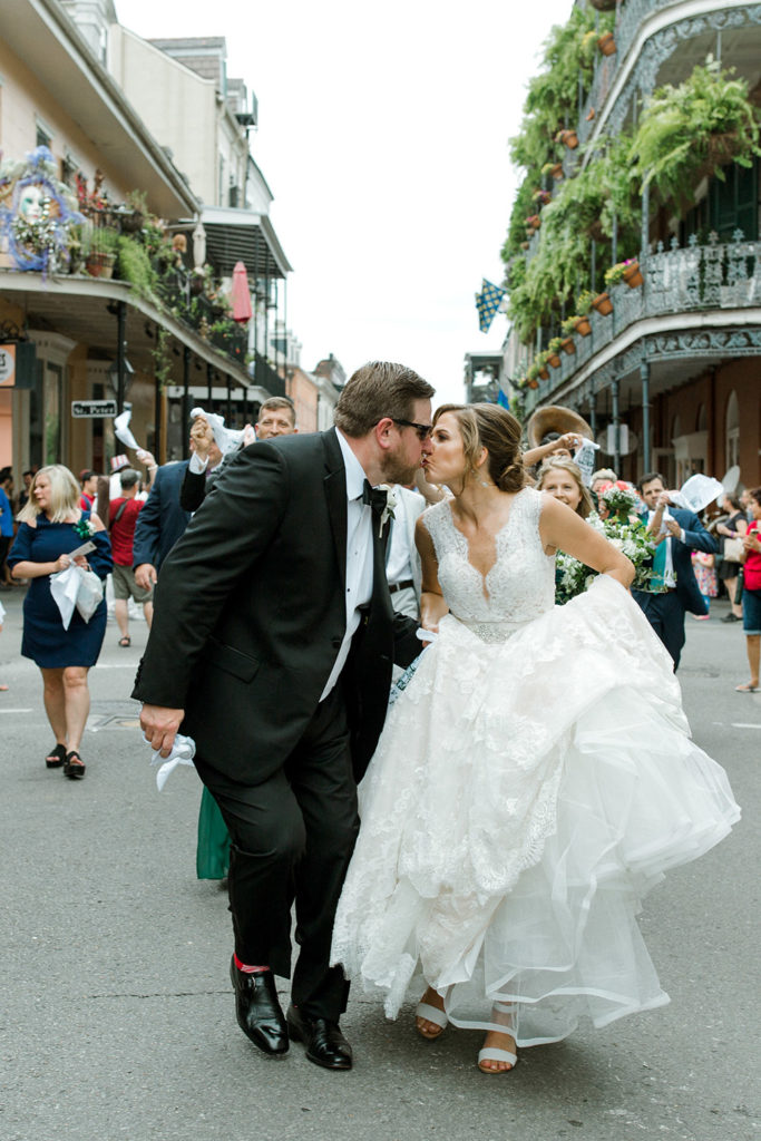 Bride and groom kiss in the French Quarter