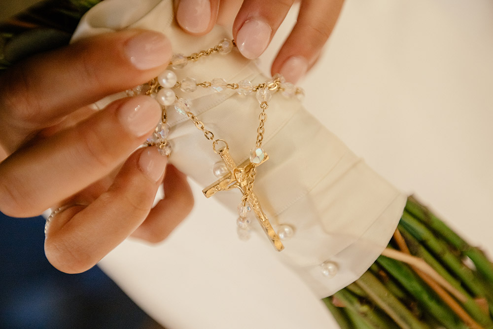 Elizabeth carried the rosary from her First Communion on her wedding day.