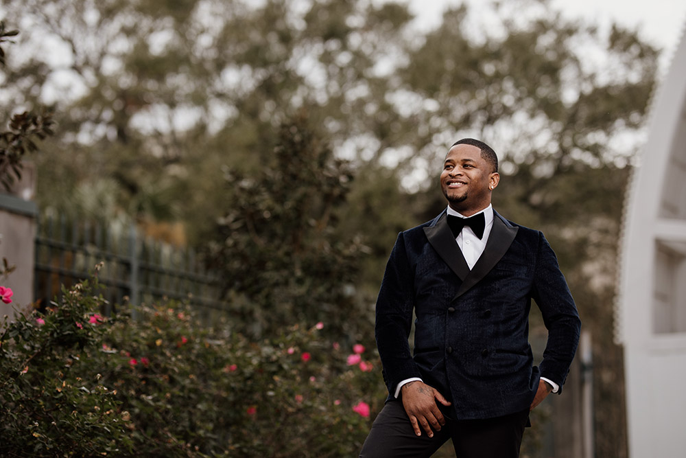 Jerome wore a custom tailored tuxedo by Luca Falcone. Photo by Audie Jackson