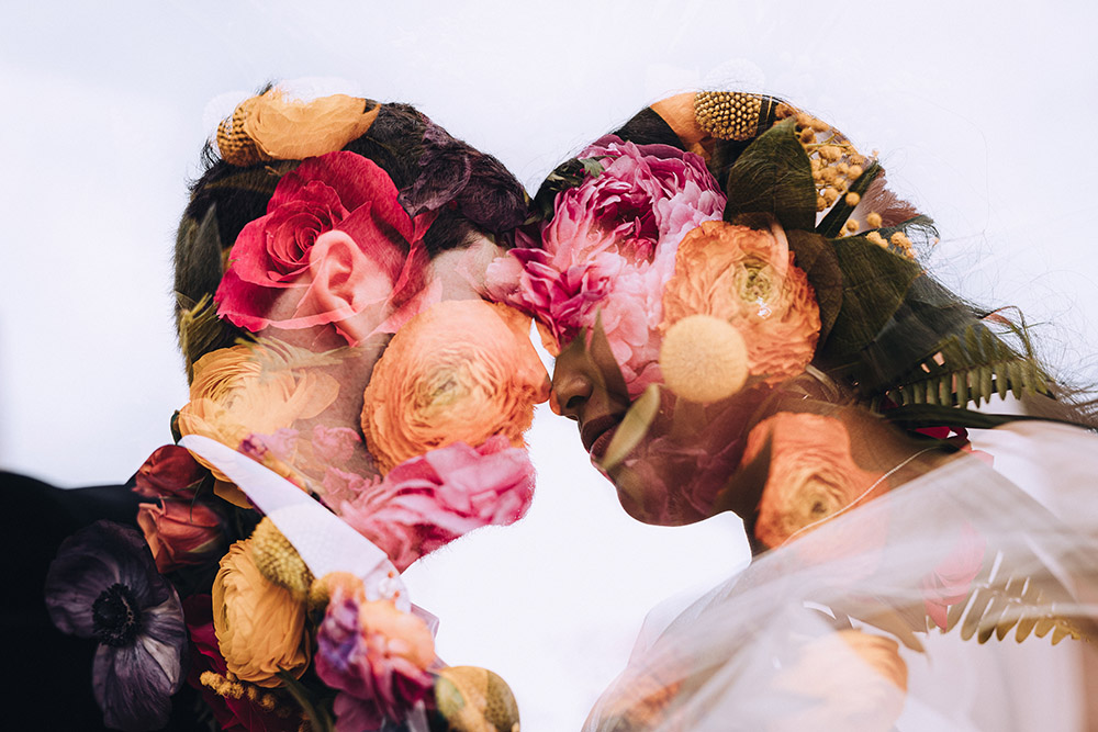 Double exposure of Erik and Isabella's profiles with the wedding bouquet.