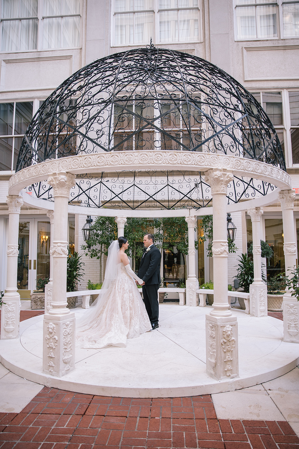 Francesca and Stanton's first look in the Ritz Carlton's courtyard.