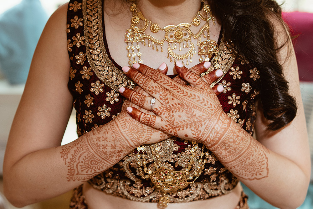 A bride wears a lab-created diamond engagement ring from Brilliant Earth. Photo: Dgass Photography