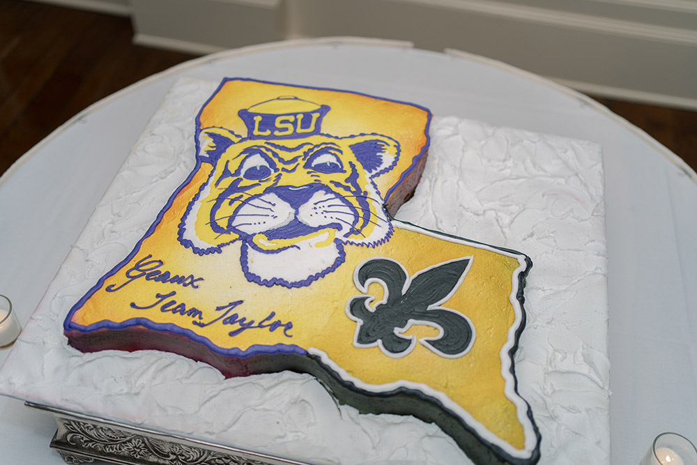 Louisiana-shaped groom's cake with Mike the Tiger and Saints Fleur De Lis