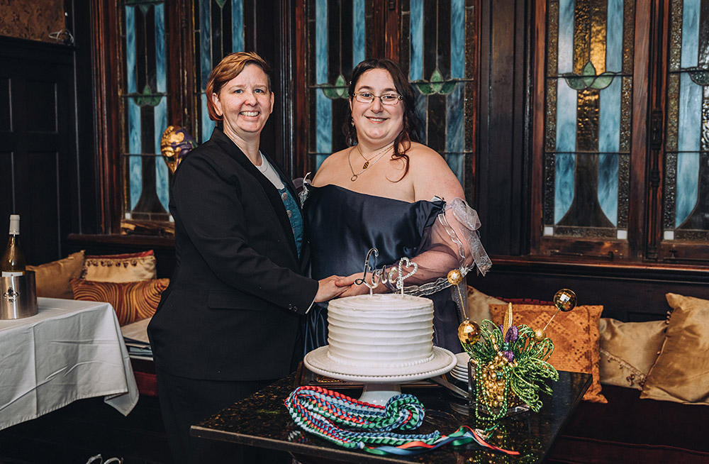 the brides cut the wedding cake