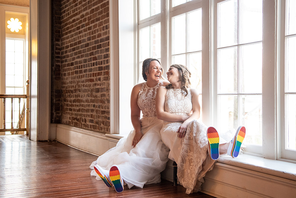 the brides wear rainbow soled shoes