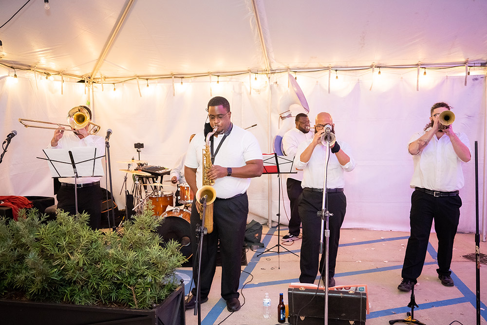 J.A.M. Brass Band performs
