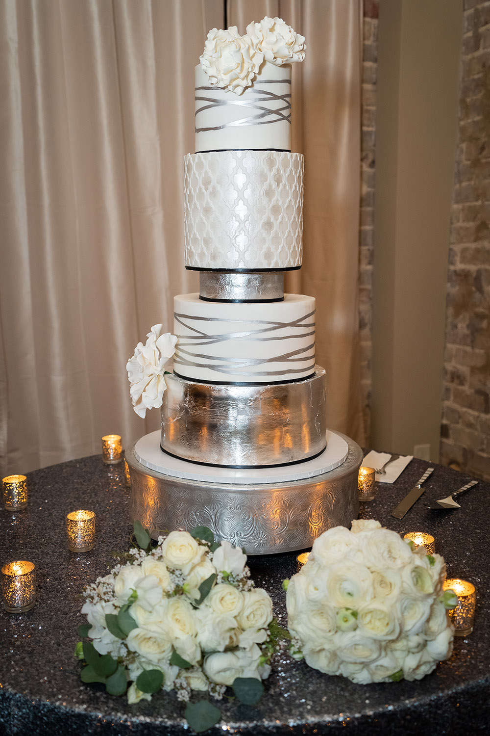 5 tier silver and white wedding cake