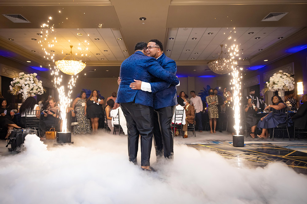 the grooms first dance with fog effects and cold spark fountains