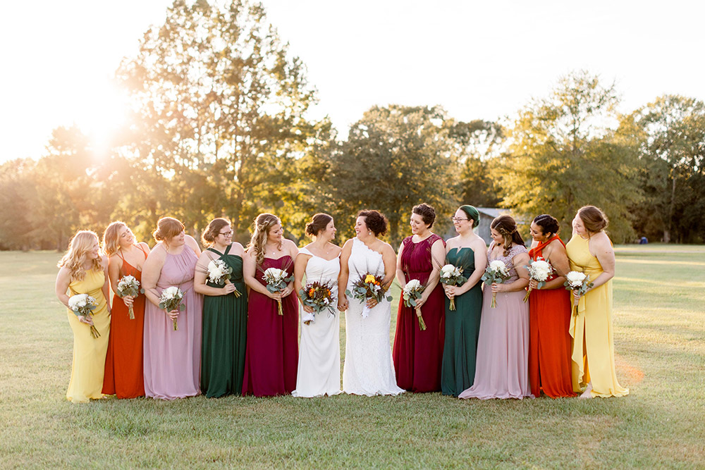 the brides and bridesmaids' in a fall rainbow of color