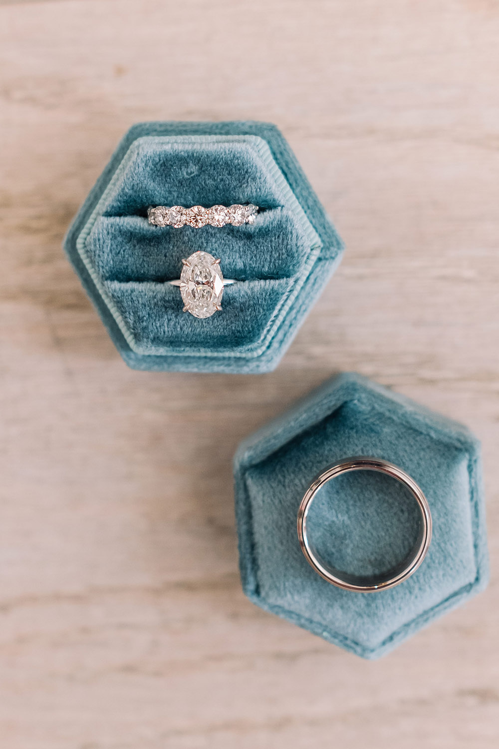 wedding rings in a blue velvet box