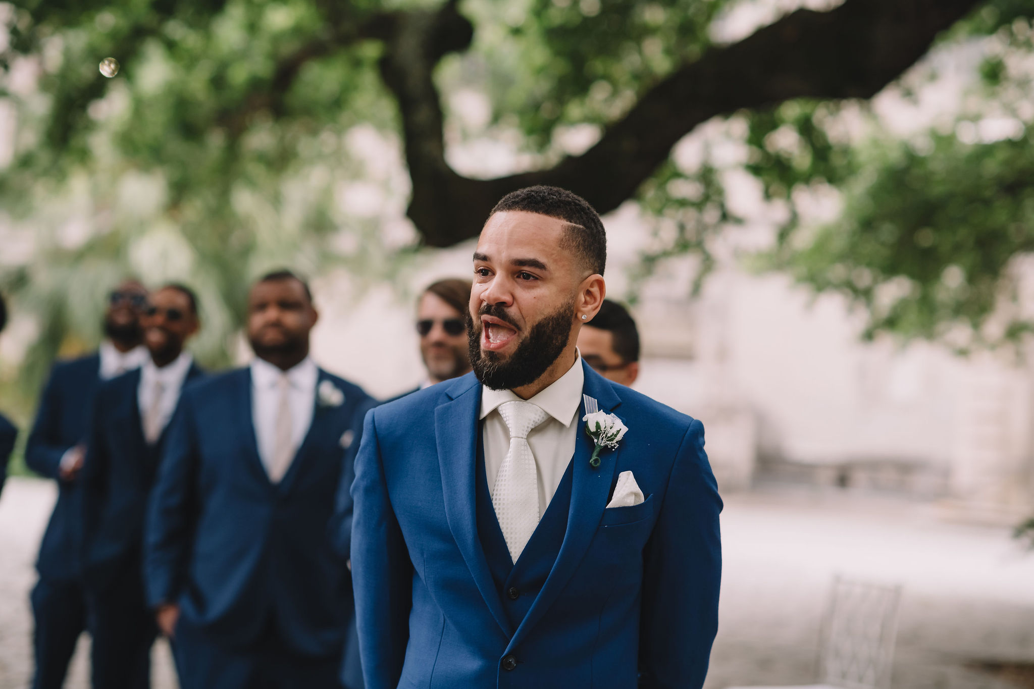 the groom reacts as he sees the bride for the first time
