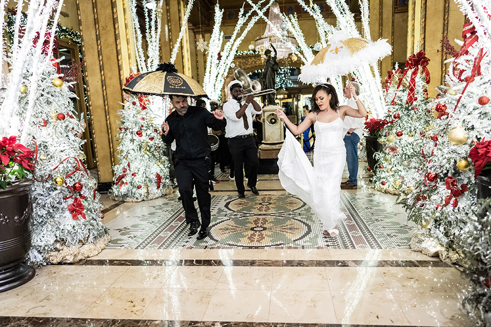 wedding second line in roosevelt new orleans hotel lobby