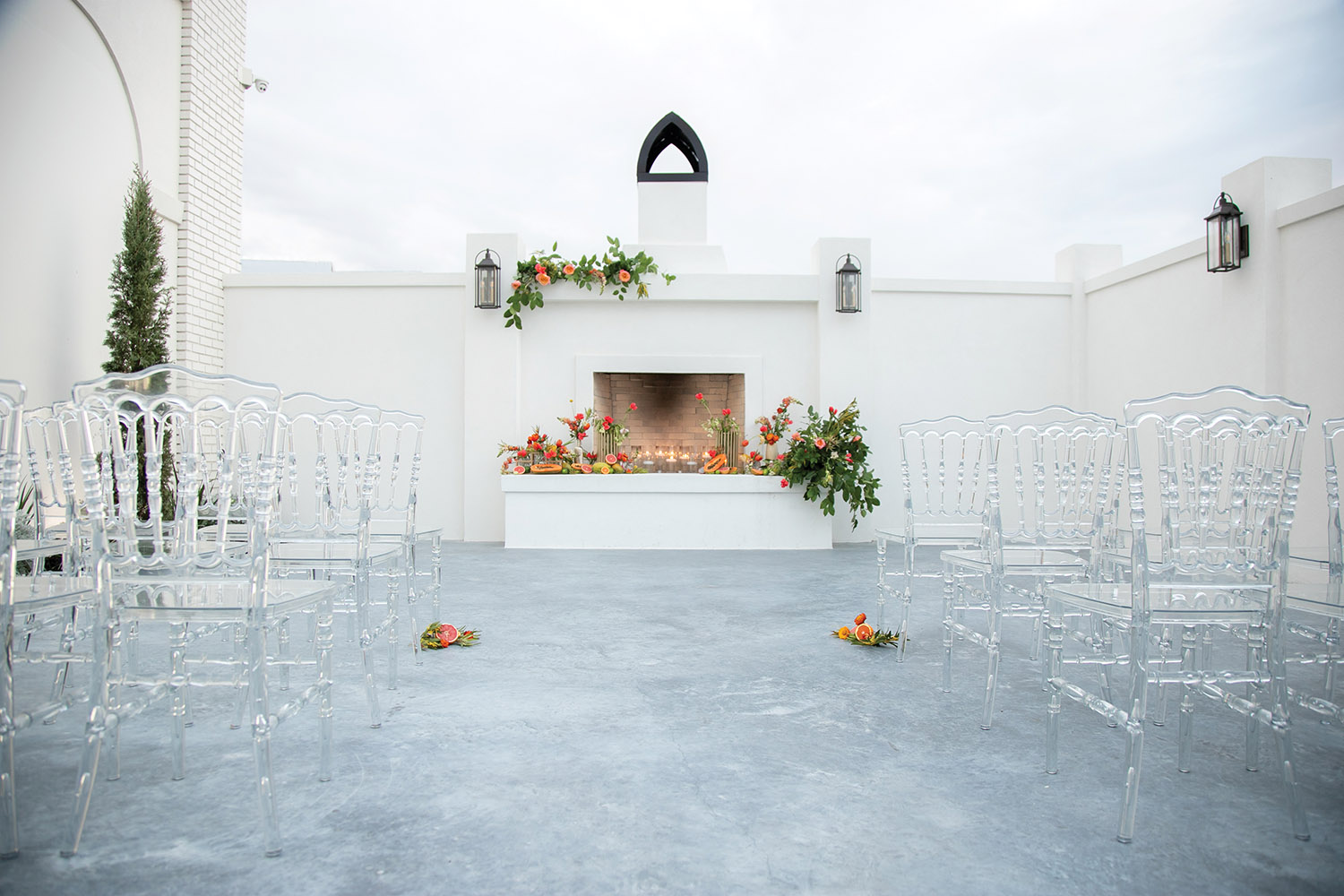Courtyard fireplace at The Moore set for a wedding ceremony