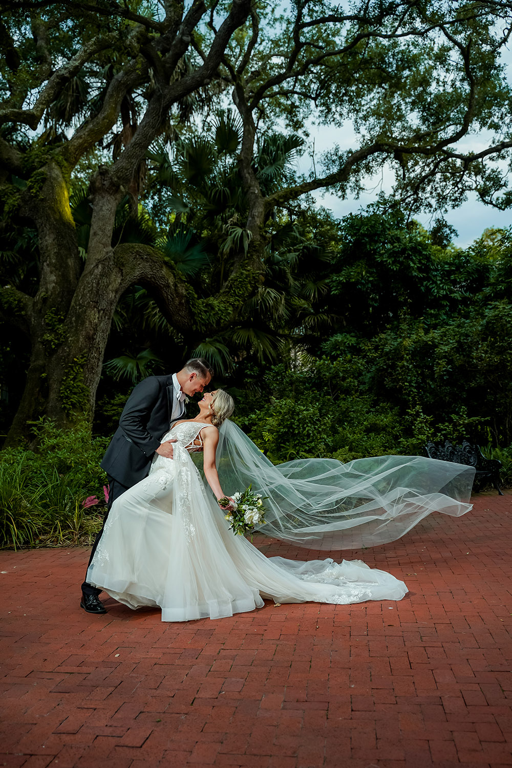 bride and groom portraits in the courtyard of the Audubon Tea Room