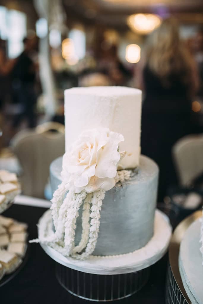 Gambino's Bakery White and silver wedding cake.