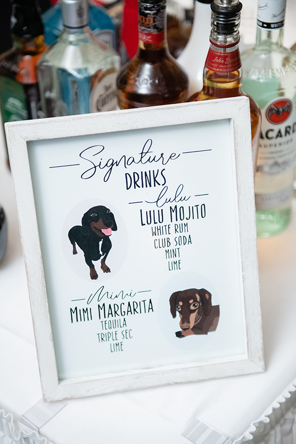 “So we have two miniature dachshunds, Lulu and Mimi,” says Abbie. “They are our whole world and we wanted to include them in every point possible. Anyone who has dachshunds know they typically bond with one person. So Lulu signified the bride’s drink and Mimi signified the groom’s drink. For the drinks themselves, Kevin and I are big tropical beach lovers. My go to is always the Mojito so we named it Lulu’s Mojito. And for the groom, he isn’t a big beer drinker but he does love his sweet drinks, especially margaritas, and so we named that one Mimi’s Margarita.”