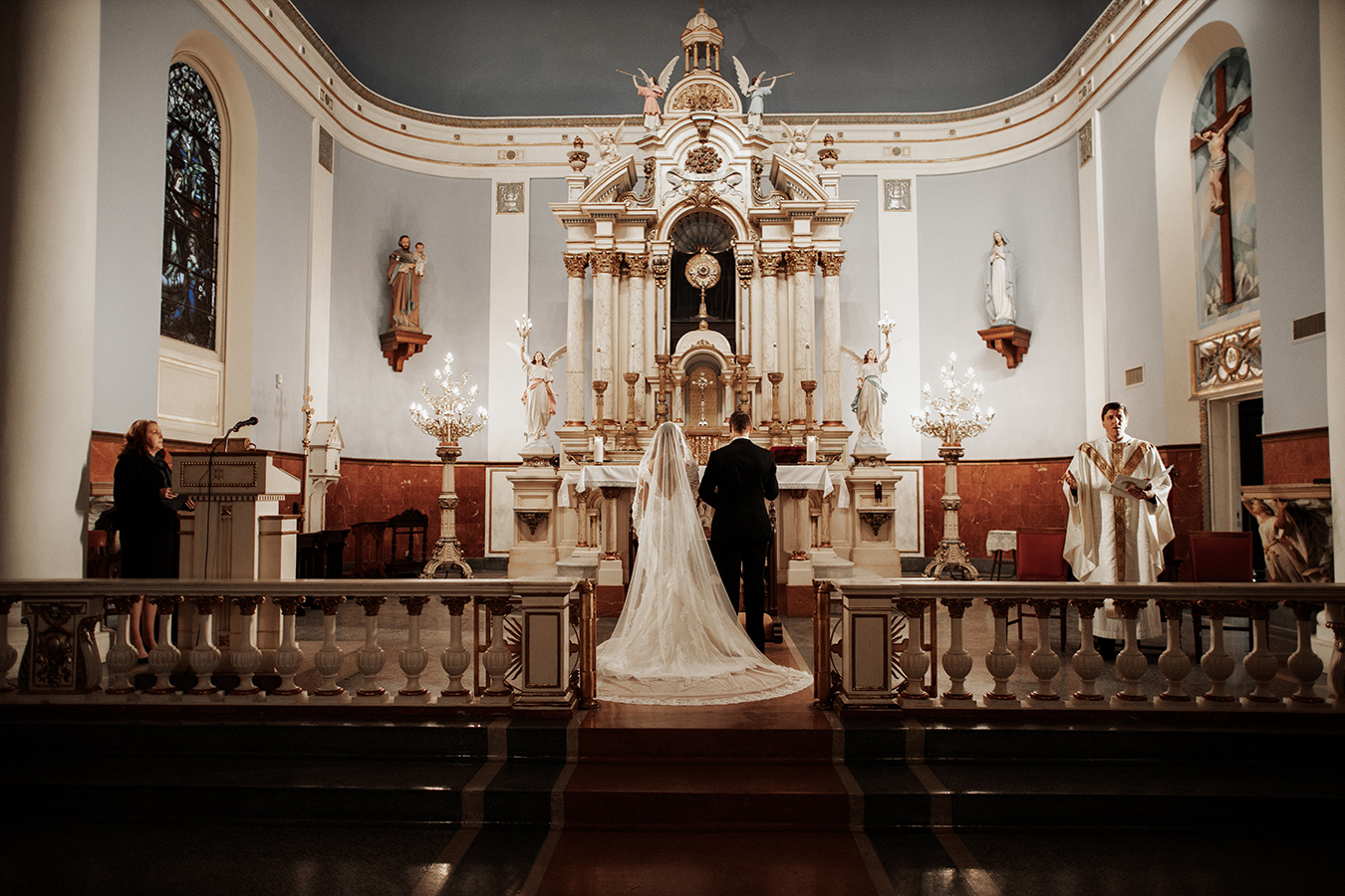 Rebecca wore a cathedral length lace mantilla veil for the traditional Catholic wedding ceremony at St. Mary’s Italian Church, one of the oldest churches in New Orleans, on Chartres Street.