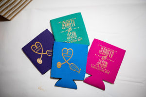Purple, Green, Blue And Pink Koozies Personalized For The Hatcher Wedding. Photo By Brian Jarreau Photography