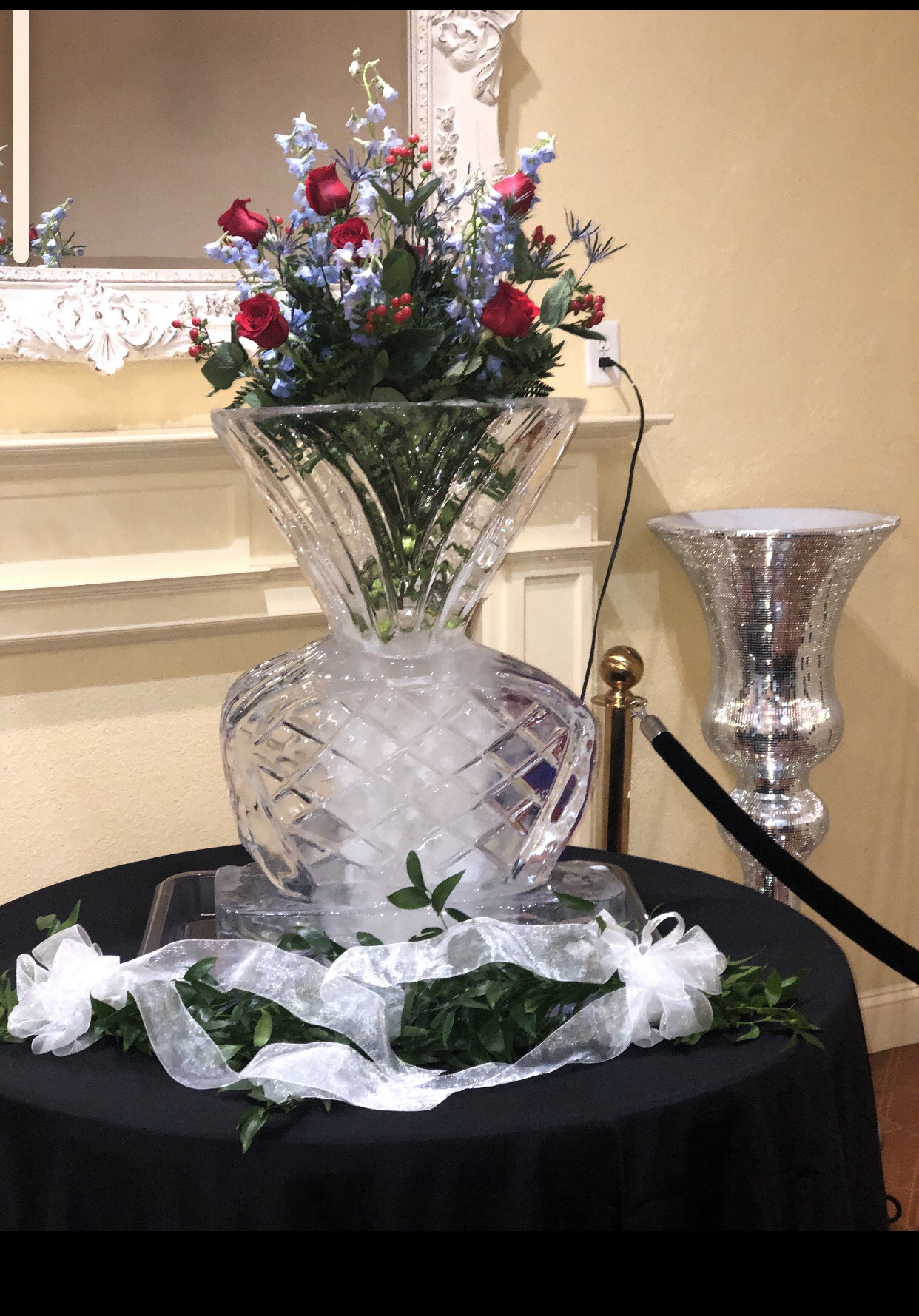 Flower Vase Ice Sculpture by J Lewis Ice Carvings