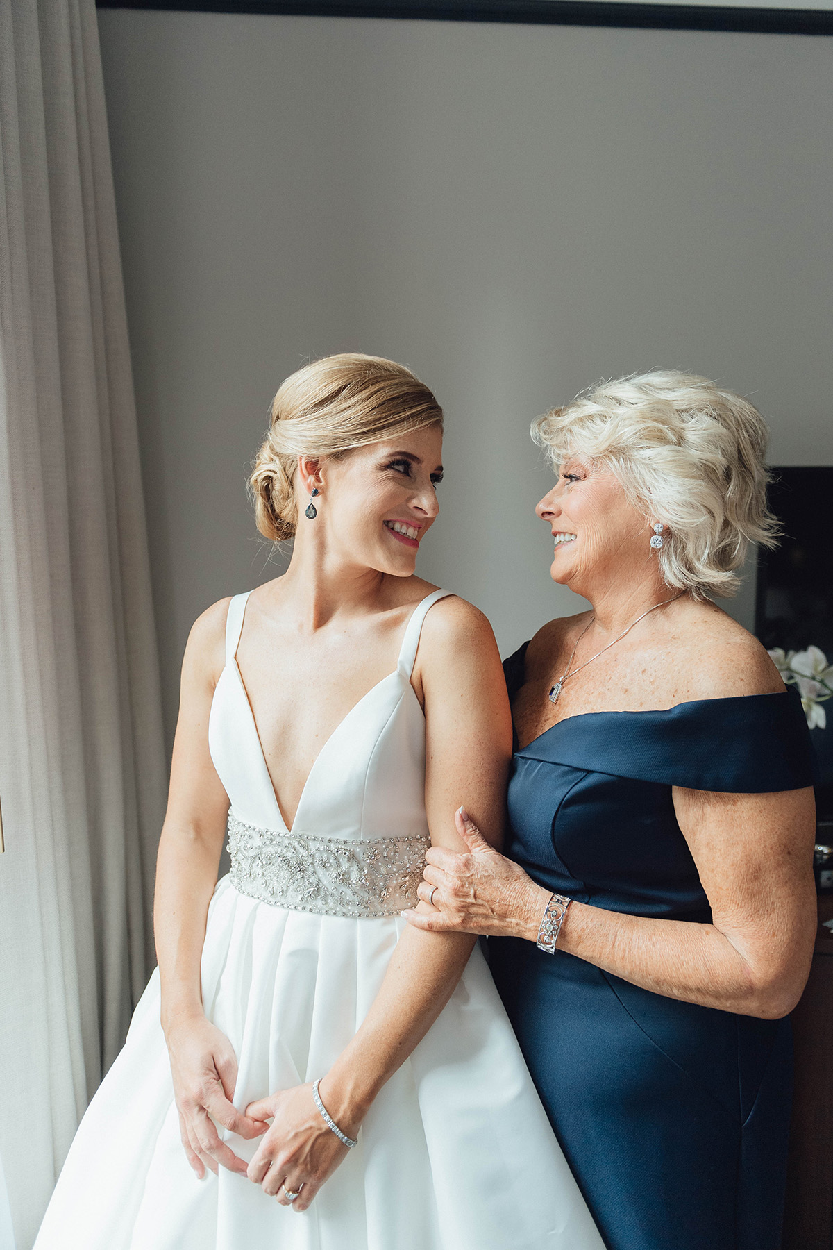 bride and mother on wedding day