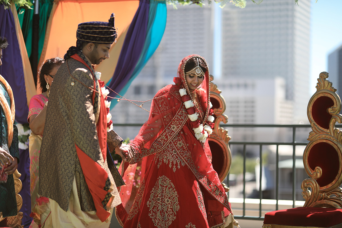 An Indian wedding ceremony on the terrace of the Riverview Room in New Orleans. Photo: Mary M Cinema