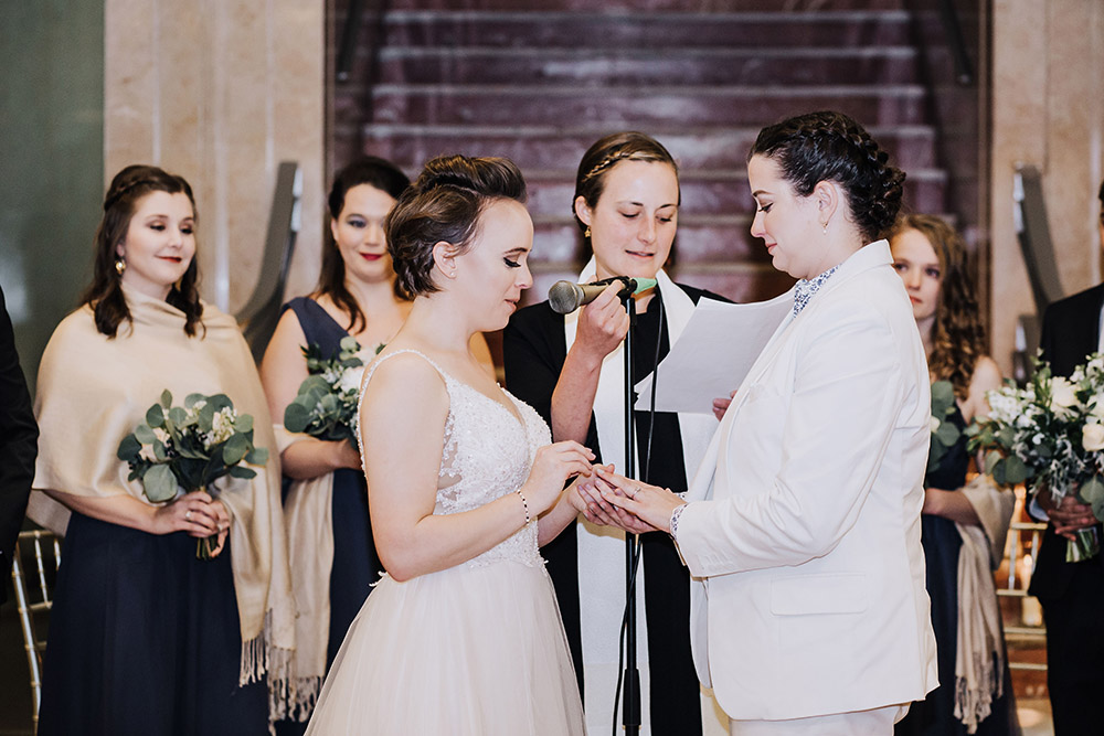 brides exchanging rings