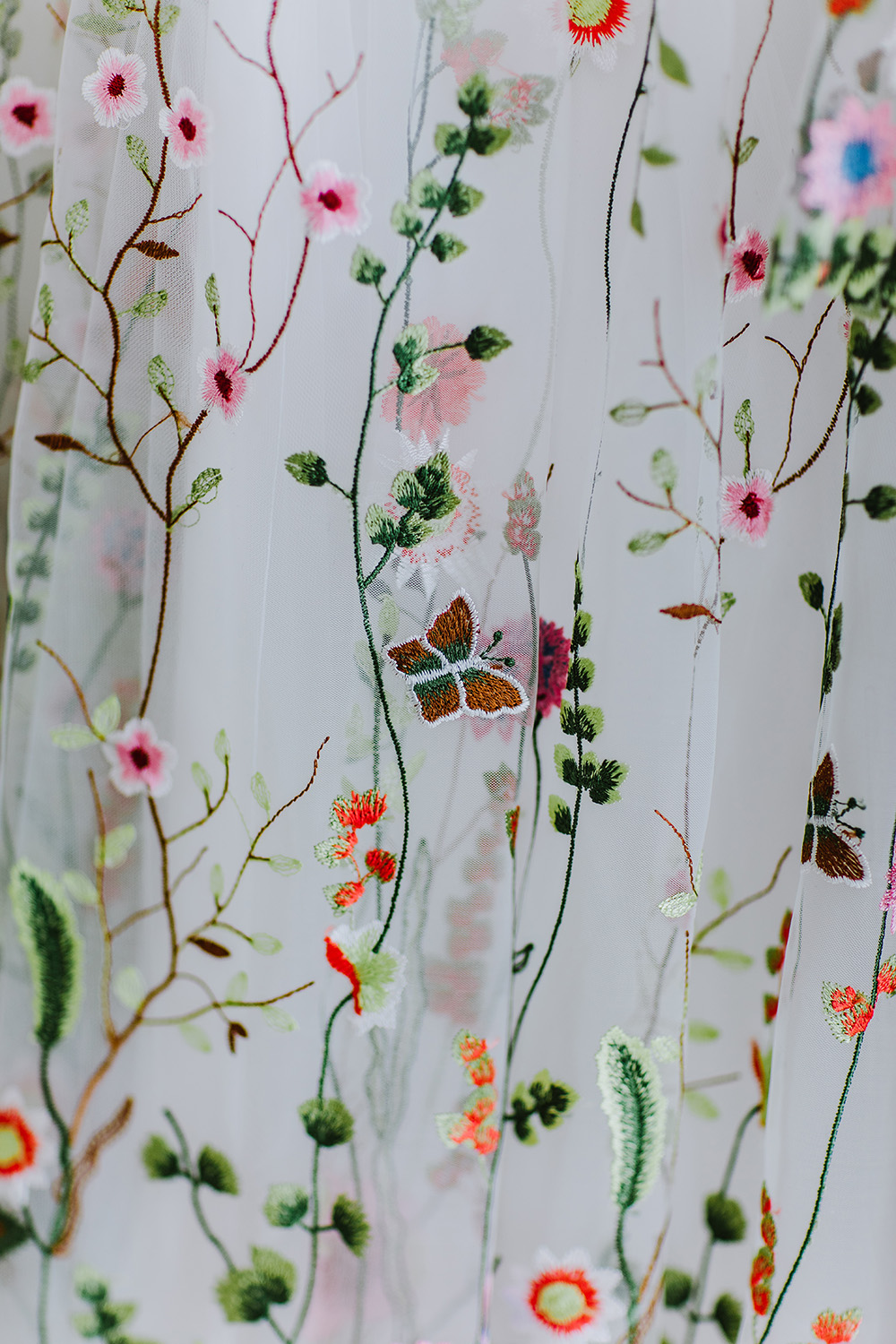 Detail of Del's floral embroidered wedding gown by Tonena Fashion House. Photo: Ashley Biltz