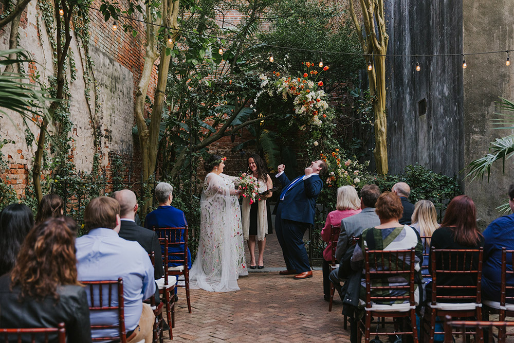 Peter celebrates after saying his vows to Del. Photo: Ashley Biltz