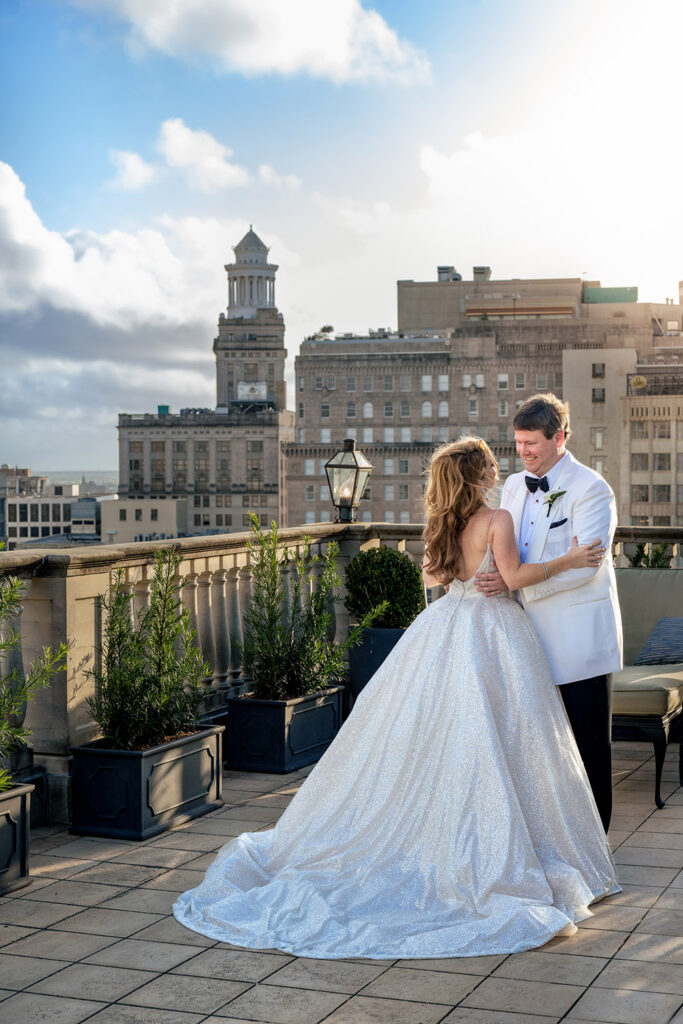 bride and groom on a new orleans rooftop