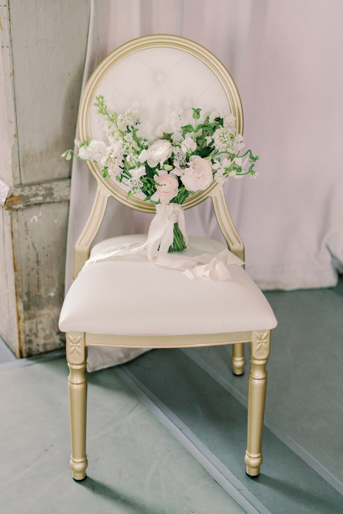Louis XVI chair with bridal bouquet